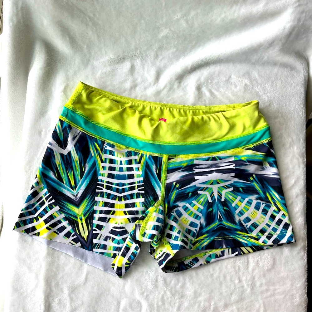 Pink Lotus Woman’s athletic workout shorts